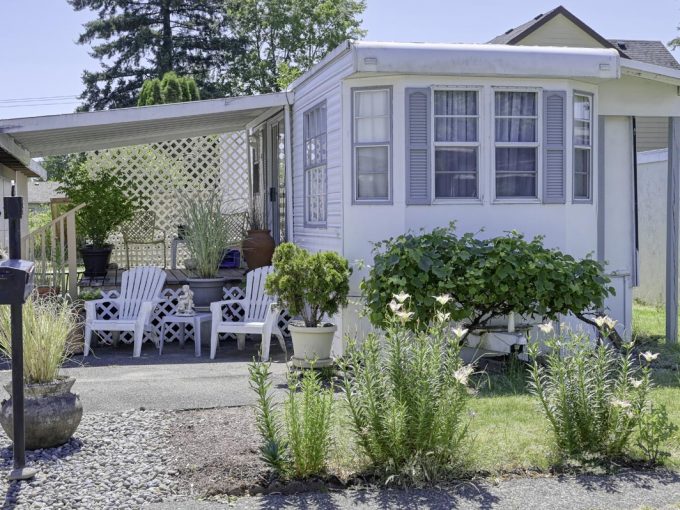 home with flowers in front yard