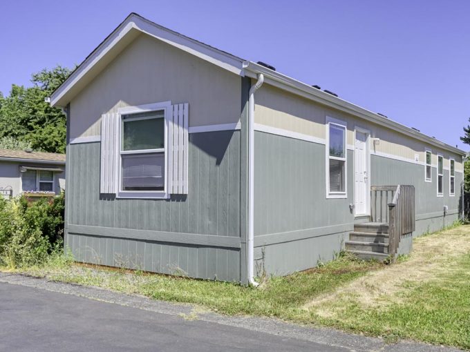 home exterior with grassy lawn